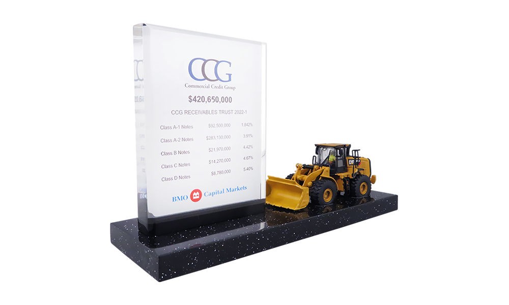 Bulldozer-Themed Financial Tombstone (Side View)