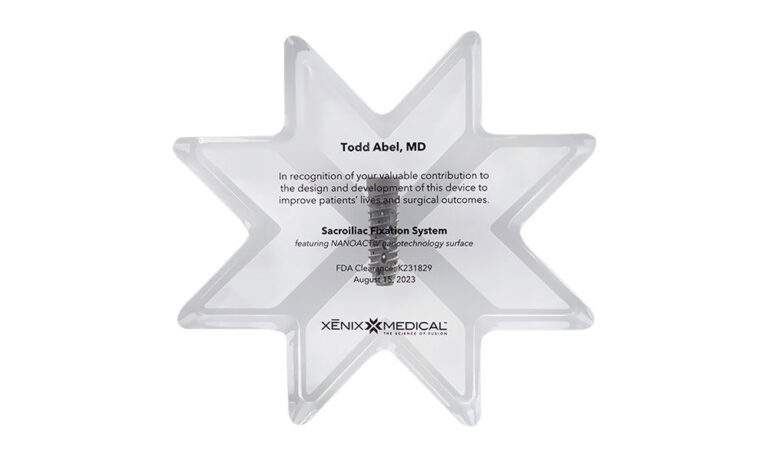 Lucite Award Incorporating Medical Implant