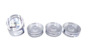 pieces in a custom Lucite modular design marking stages in a construction project