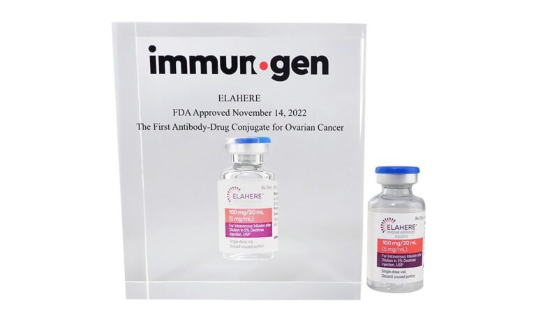 Lucite award, with embedded drug vial, celebrating FDA approval of an ovarian cancer treatment.