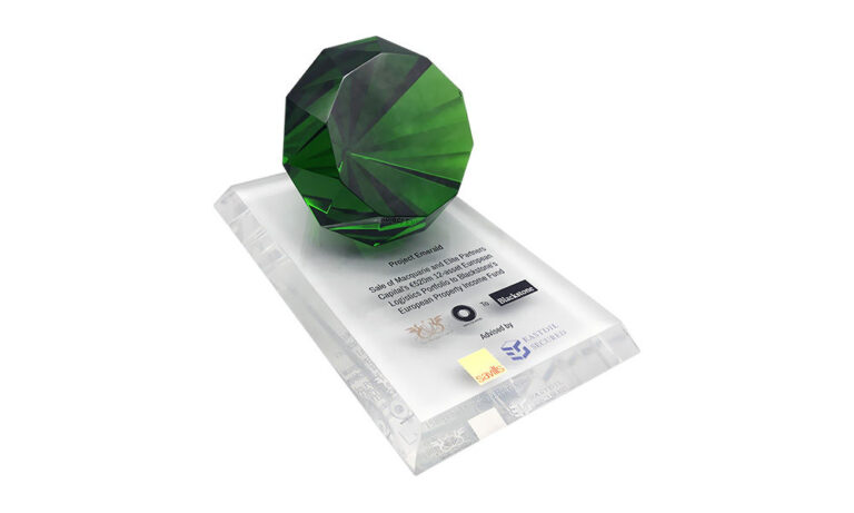 Deal tombstone with large green crystal emerald commemorating Blackstone's purchase of a European warehouse portfolio.