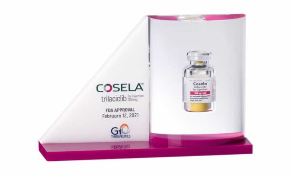 Custom Lucite, containing a drug vial, celebrating FDA approval of Cosela, a chemotherapy treatment developed by G1 Therapeutics.